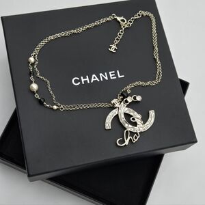 #113 Chanel Logo Script Necklace